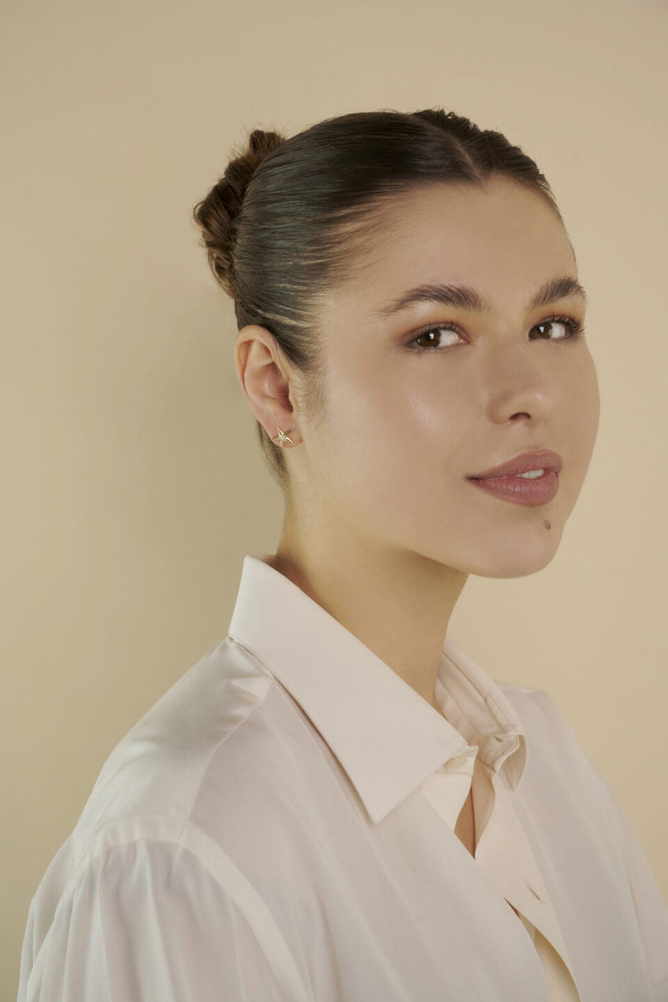 Handcrafted gold star earring design