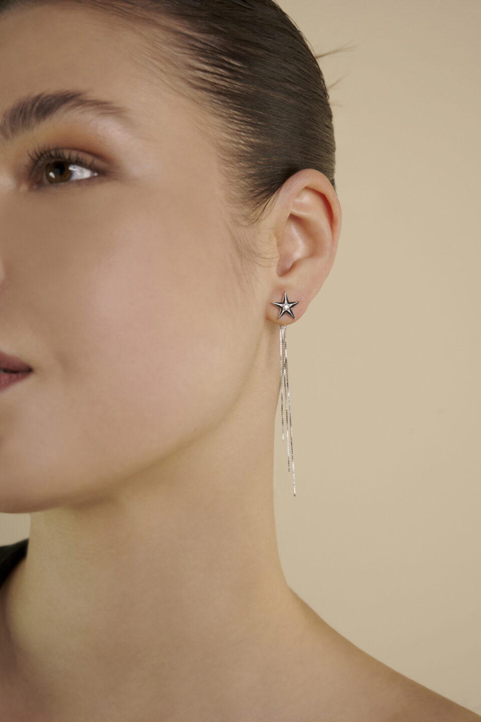 Design artigianale orecchino stella cadente oro bianco